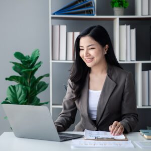 Asian women working in the office, young Asian business women as business executives.